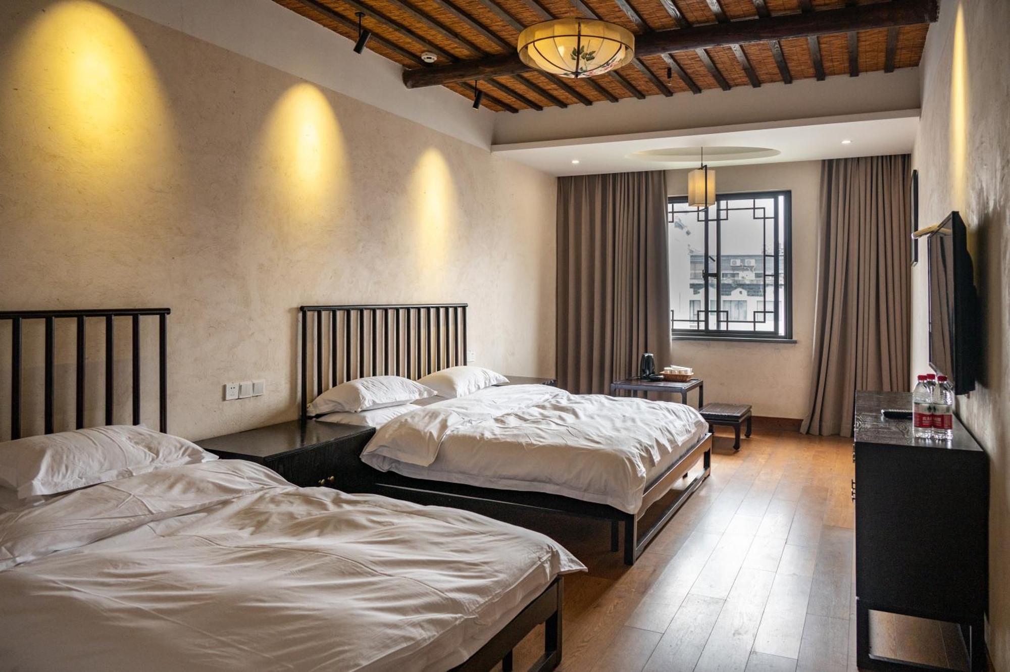 Tingjian Musu Private Soup Design Homestay - South Gate Of Wuzhen Xizha Scenic Area Tongxiang المظهر الخارجي الصورة