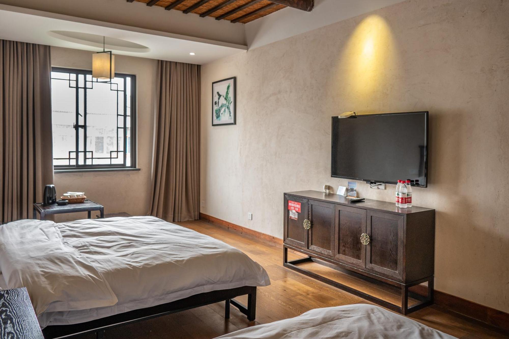 Tingjian Musu Private Soup Design Homestay - South Gate Of Wuzhen Xizha Scenic Area Tongxiang المظهر الخارجي الصورة